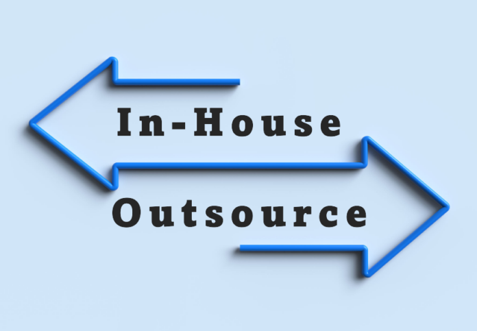 two arrows, one pointing to in-house, the other to outsource