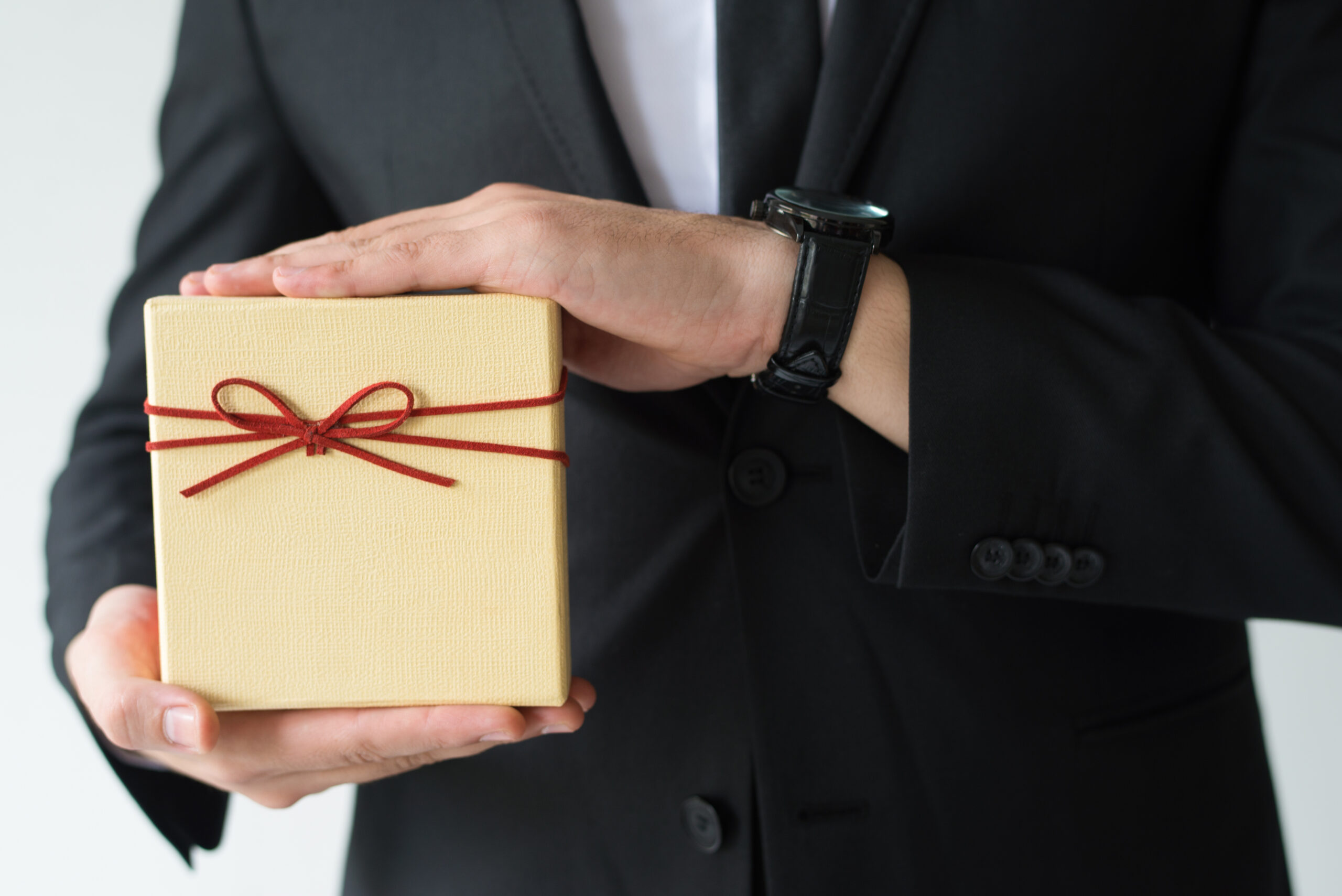 man holding event gift
