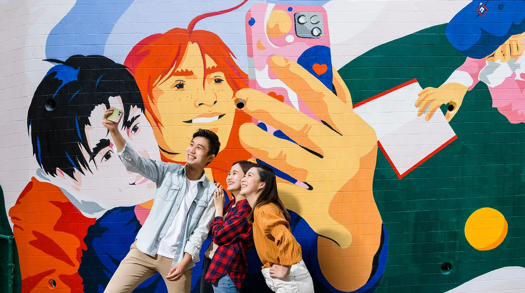 people posing by wall murals in hong kong Ying’nFlo by Langham Hospitality Group