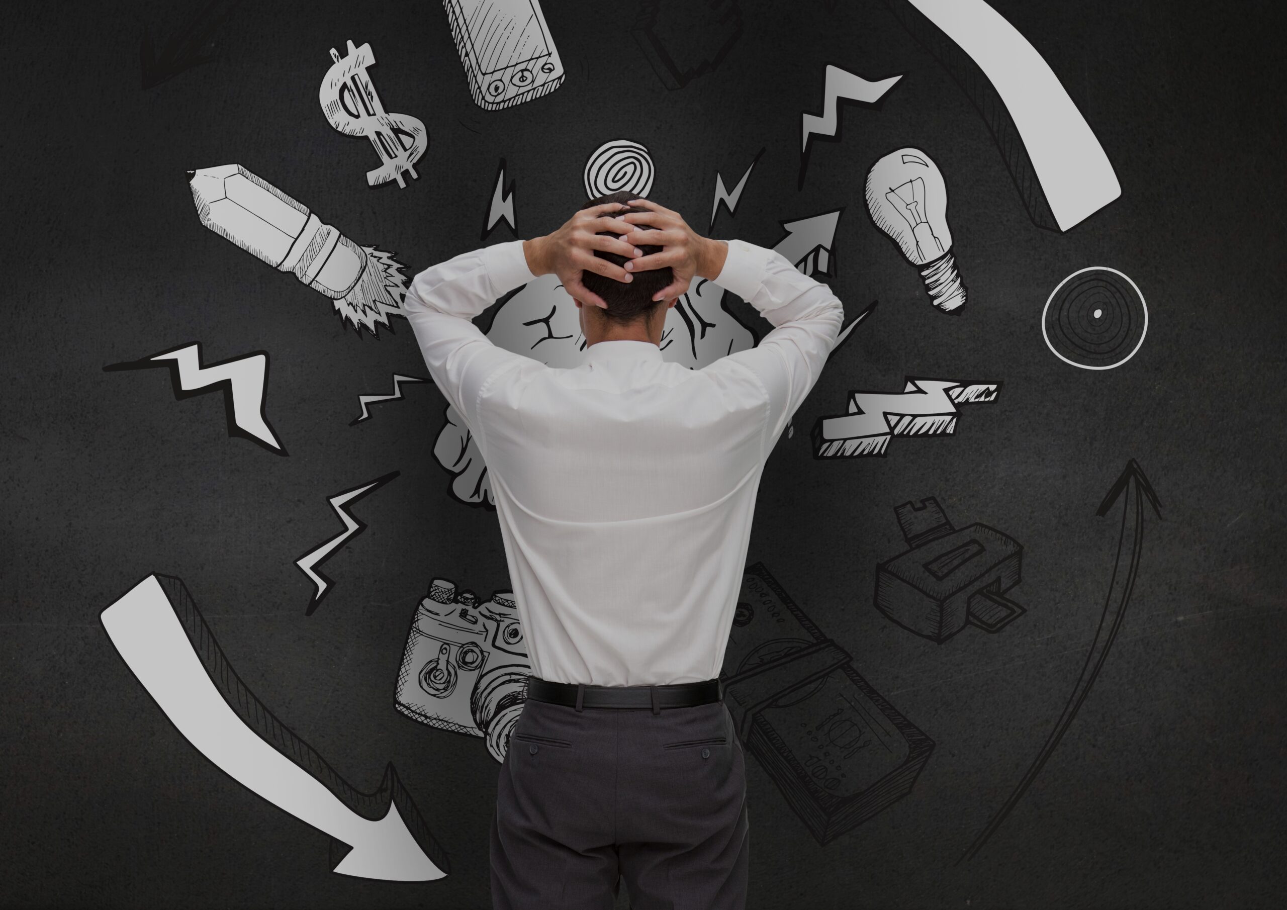 Digital composition of a confused man looking at graphics on black wall